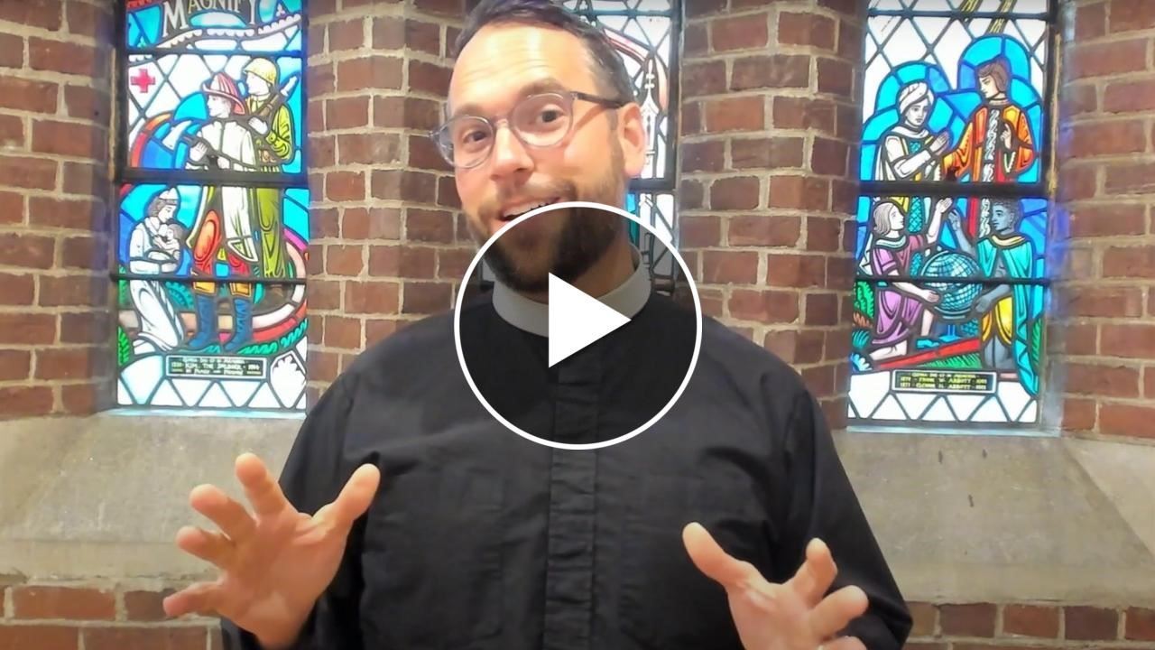 YouTube thumbnail of Reverend Nick Myers in a white button-down shirt in front of stained glass windows