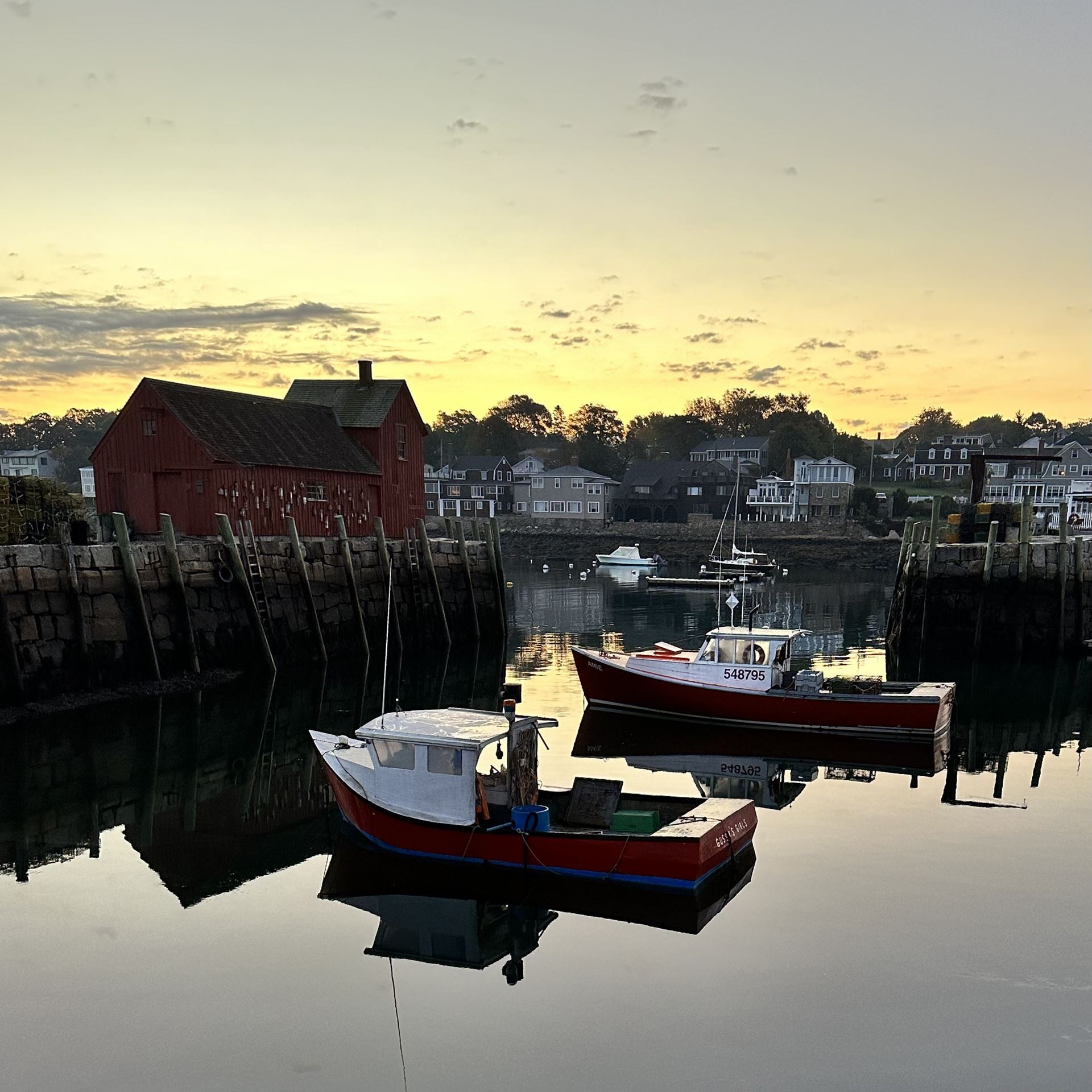 Boats on water at sunset in Rockport, Massachusetts