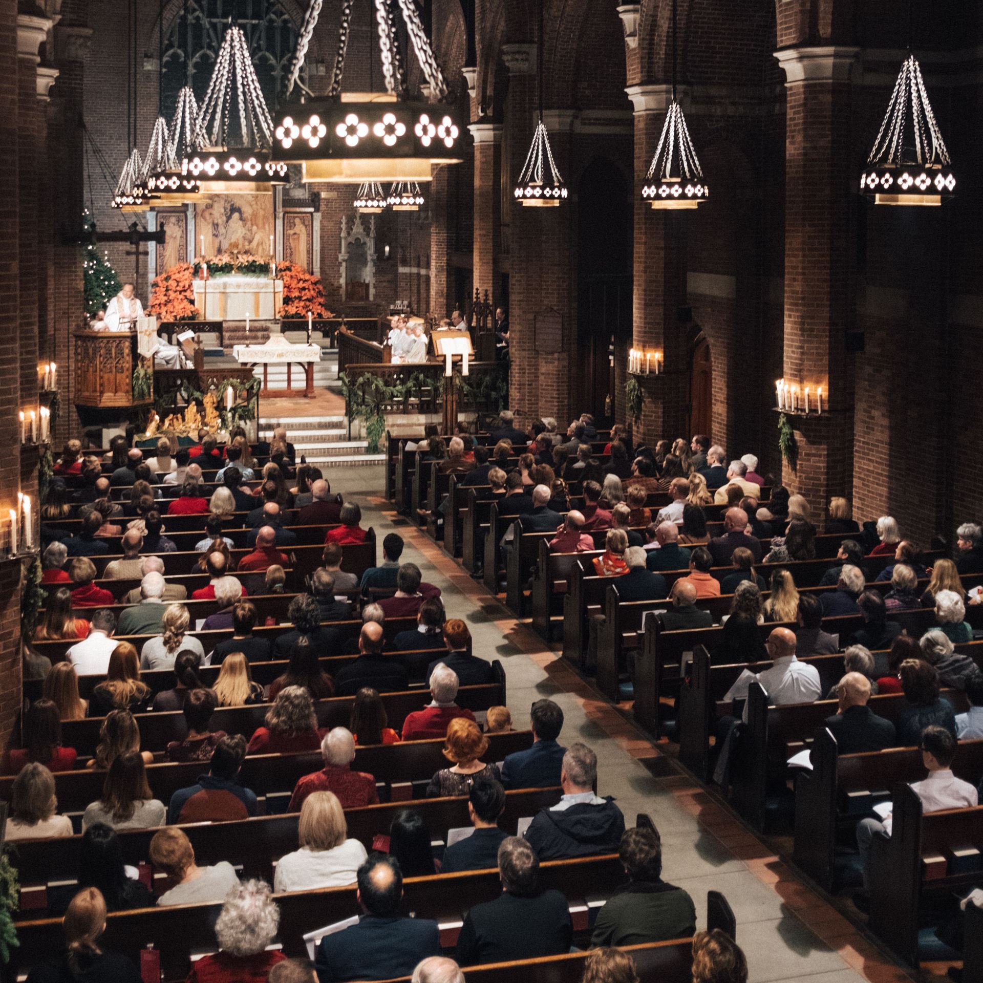 Filled sanctuary at Christmas Eve at Parish of the Epiphany