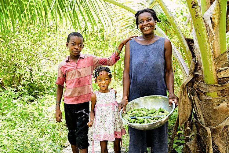 Haitian mother, son, and daughter. Photo courtesy of Locally Haiti.