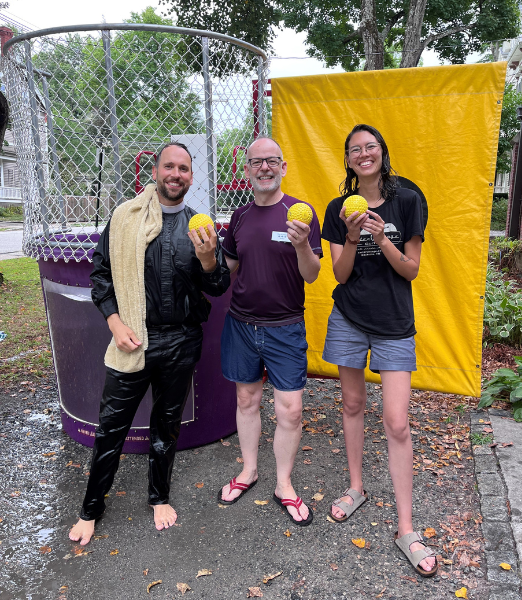 From left: Rev. Nick Myers, Dave McSweeney, and Rev. Janelle Hiroshige in front of dunk tank at Parish of the Epiphany's 2022 Rally Day