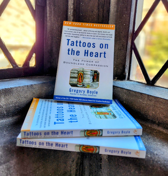 Copies of the book "Tattoos on the Heart" by Father Gregory Boyle